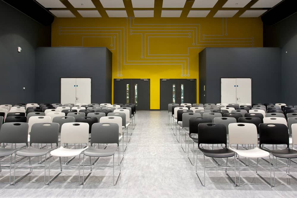 The Maestro stacking chair is available in a range of colours and finishes.